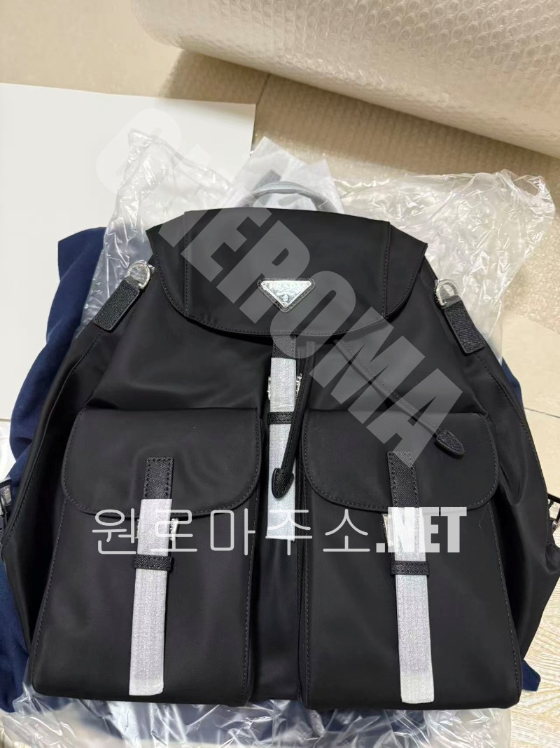 정*빈 고객님 프라다 리나일론 백팩